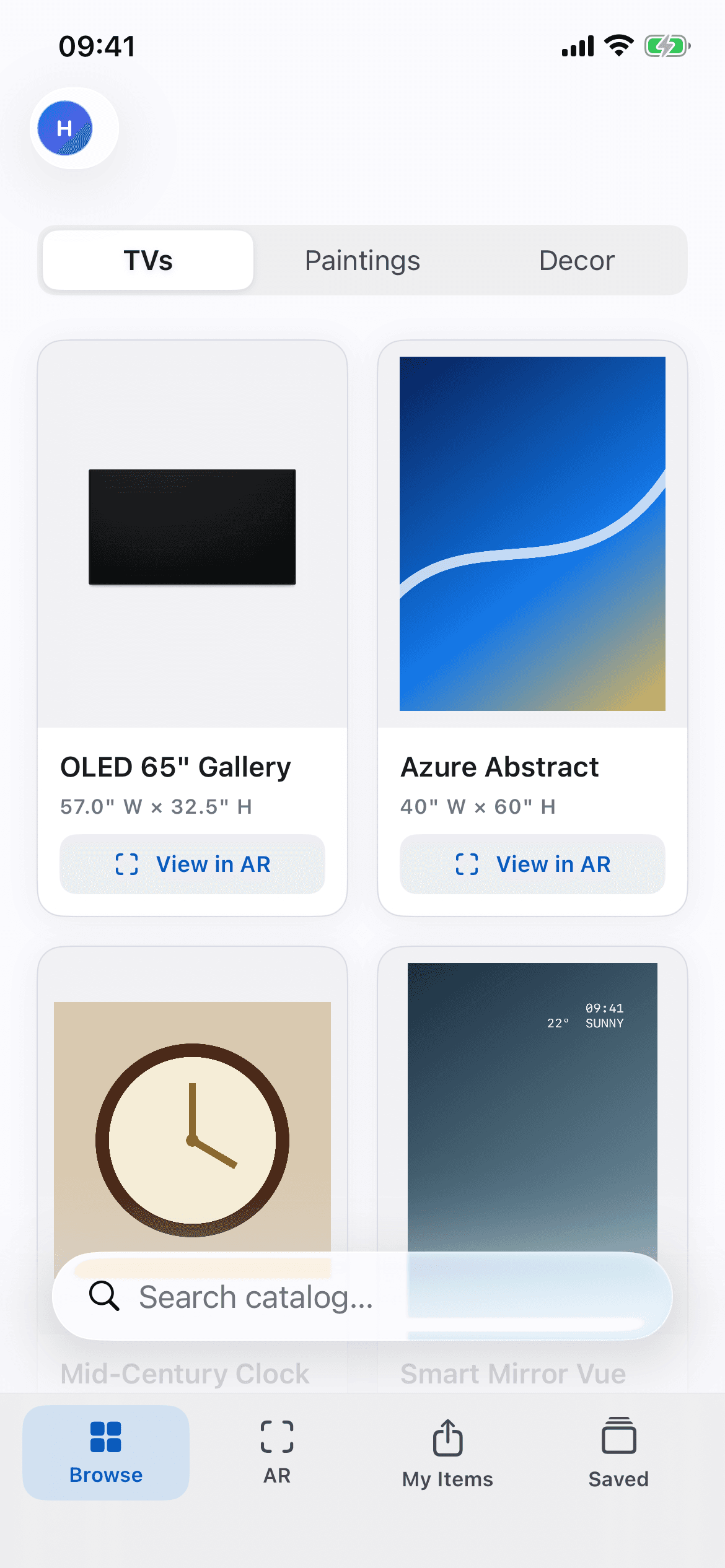 The HangIt app showing TVs, paintings, and decor ready to preview in AR